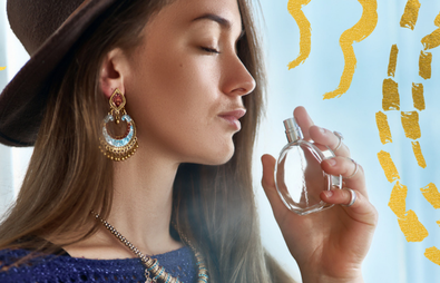 Woman smelling perfume with gold details