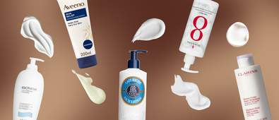 five different body lotion bottles against a brown gradient background